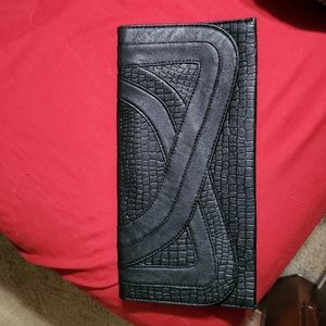 Black leather clutch